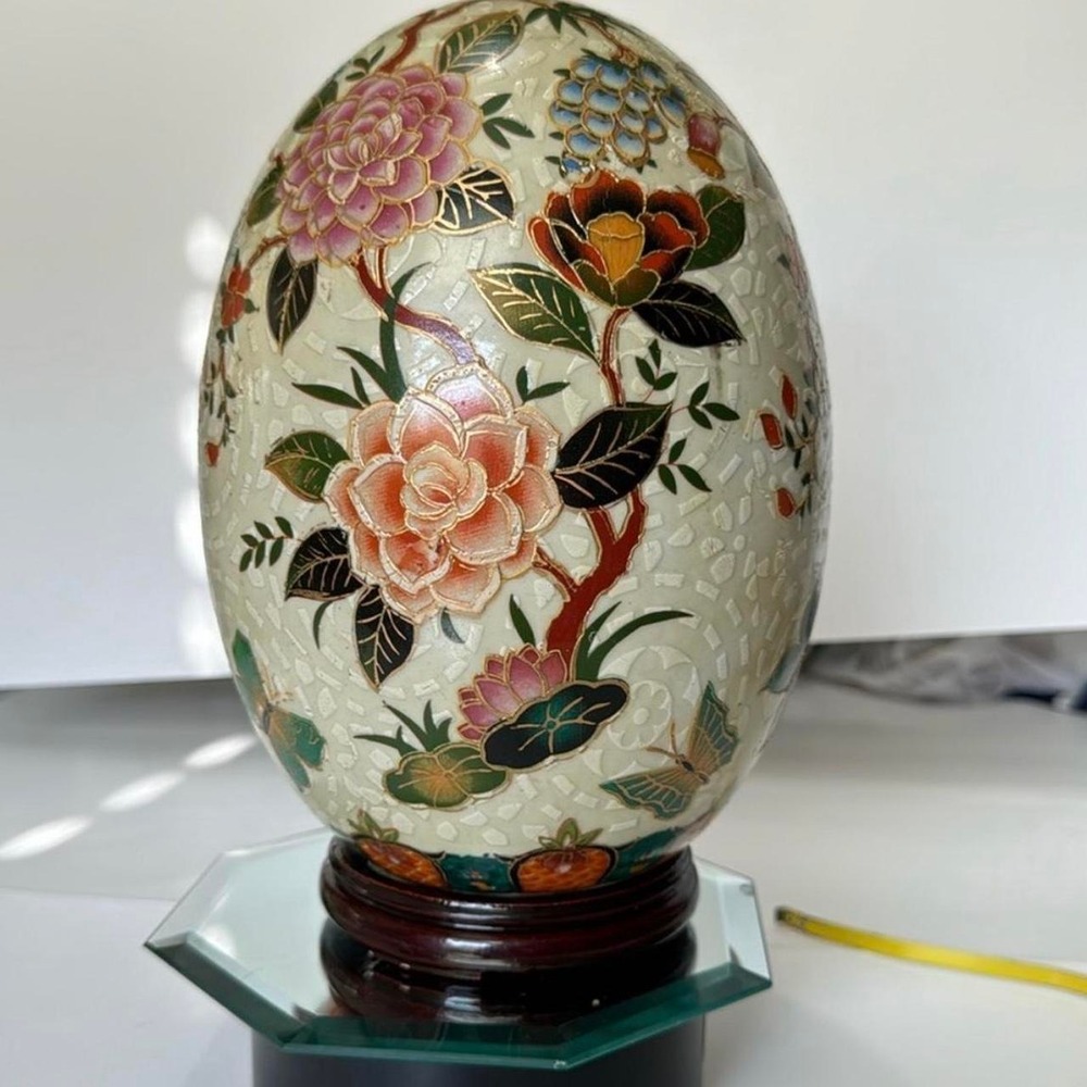 Vintage Satsuma egg on a wooden